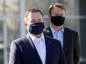 Premier Jason Kenney and Health Minister Tyler Shandro take part in a press conference in Edmonton on Thursday, March 18, 2021.