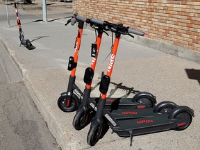 Spin e-scooters have arrived in Edmonton, Thursday April 15, 2021. Photo by David Bloom