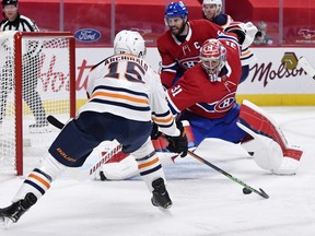 Montreal Canadiens goalie Carey Price (31) stops Edmonton Oilers forward Josh Archibald (15) during the second period at the Bell Centre on April 5, 2021.