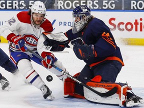 Edmonton Oilers goaltender Mike Smith (41) makes a save against Montreal Canadiens forward Jonathan Drouin (92) during the second period at Rogers Place.