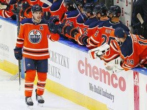 Edmonton Oilers forward Ryan Nugent-Hopkins (93) celebrates a goal against the Calgary Flames at Rogers Place on Apr 2, 2021.
