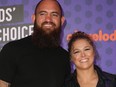 Ronda Rousey and her husband, Travis Browne pose for a photo before the Nickelodeon Kids' Choice Sports Awards in Santa Monica, Calif. On July 20, 2018.