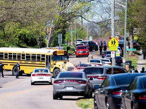 Police attend a shooting at Austin-East Magnet High School in Knoxville, Tennessee, U.S. April 12, 2021.   Brianna Paciorka/News Sentinel/USA Today Network via REUTERS   NO RESALES. NO ARCHIVES. MANDATORY CREDIT. THIS IMAGE HAS BEEN SUPPLIED BY A THIRD PARTY. ORG XMIT: TOR516