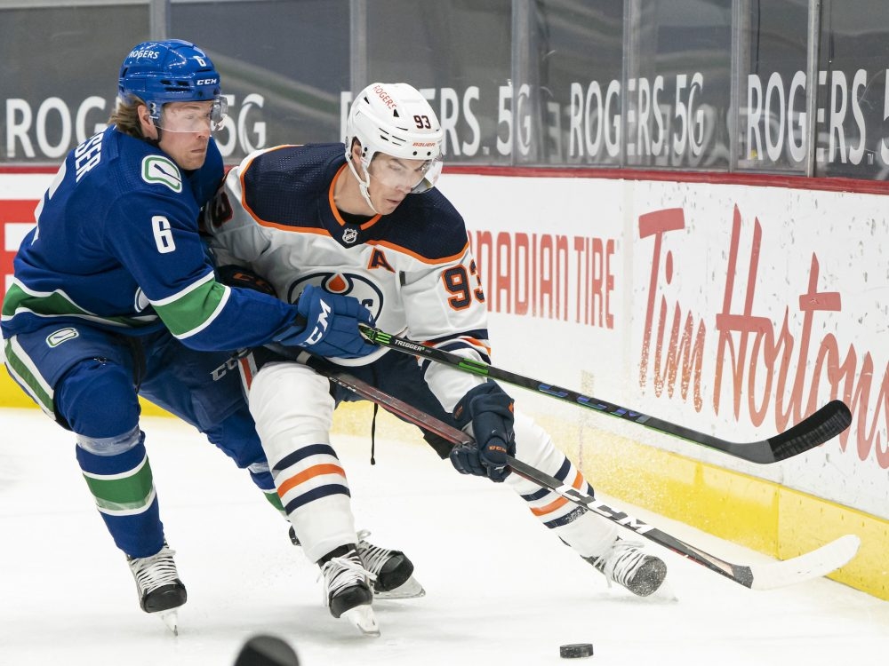 Connor McDavid reaches 100 points, Oilers beat Canucks 4-3