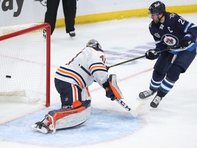 Blake Wheeler of the Winnipeg Jets beats Mike Smith of the Edmonton Oilers for a goal in Game 3 of the First Round of the 2021 Stanley Cup Playoffs on May 23, 2021 at Bell MTS Place in Winnipeg.