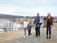 Brad and Kirsty Sanesh with their children Faith, 10, Shea, 2, and Paxton, 6, love their home for the lake access to Ghost Lake as part of CottageClub.