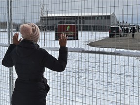A women chanting as a crowd of about 400 gathered outside GraceLife Church on the first Sunday after the closure west of the Edmonton city limits, April 11, 2021. Ed Kaiser/Postmedia