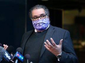 Mayor Naheed Nenshi speaks to reporters outside council chambers in City Hall. Monday, Feb. 1, 2021.