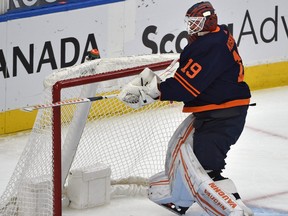 Edmonton Oilers goalie Mikko Koskinen (19) breaking his stick after allowing the fourth goal in four shots against the Vancouver Canucks during NHL action at Rogers Place in Edmonton, May 6, 2021.