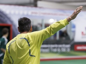 A referee makes a call during a game between Inter 2000 and Spruce Grove Saints (2000) on the final day of play at the Denny Andrews Ford Polar Cup at Edmonton Soccer Centre South in Edmonton on Monday, Dec. 29, 2014.
