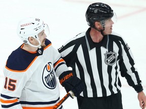 Edmonton Oilers forward Josh Archibald speaks with Winnipeg Jets defenceman Logan Stanley after he hit him low and was penalized in Game 3 of a Stanley Cup playoff series in Winnipeg on Sun., May 23, 2021.