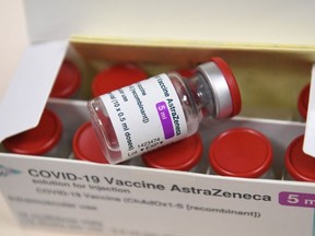 In this file photo taken on February 6, 2021 a box containing vials of the AstraZeneca Covid-19 vaccine is pictured at the Foch hospital in Suresnes, on the start of a vaccination campaign for health workers with the AstraZeneca/Oxford vaccine.