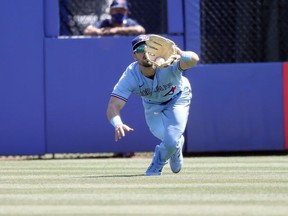 Toronto Blue Jays center fielder Randal Grichuk catches a fly ball during the eighth inning against the Tampa Bay Rays at TD Ballpark.