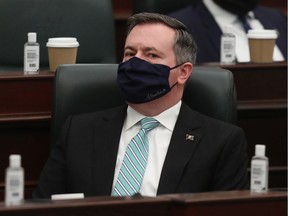 Premier Jason Kenney in the Alberta Legislature during the reading of the 2021 provincial budget on Feb. 25, 2021.