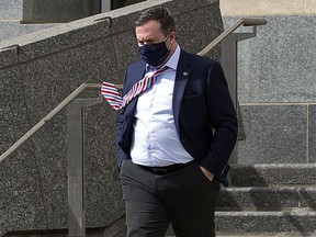 Alberta Premier Jason Kenney leaves the Federal Building at the Alberta Legislature, in Edmonton Thursday April 8, 2021. Photo by David Bloom