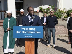 Minister of Justice Kaycee Madu provided, during a news conference in front of the Al Rashid Mosque in Edmonton on Friday, June 11, 2021, details about a program to help protect religious and multicultural organizations targeted by hate-motivated crime. (photography by Chris Schwarz/Government of Alberta)