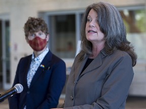 NDP mental health and addictions critic Lori Sigurdson, right, and NDP MLA Janis Irwin, left, called on the province to tackle the spike in overdoses, Friday, June 11, 2021.