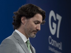 Canadian Prime Minister Justin Trudeau listens to question during a news conference at Tregenna Castle following the G7 Summit in St. Ives, Cornwall, England, on Sunday, June 13, 2021.