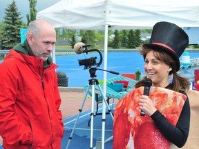 Coral Wiebe, right, and Andrew Giles speak at the Suviorfest ultramarathon race in 2019 at Bev Facey Community High School in Sherwood Park.