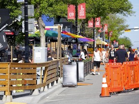 Patios along 17 Ave. S.W. in Calgary were busy as businesses reopened on Tuesday, June 1, 2021.