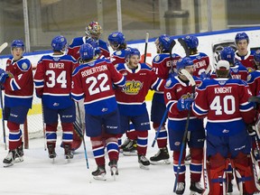 The Edmonton Oil Kings celebrate their 3-0 win over the Medicine Hat Tigers on April 22, 2021, in Edmonton.