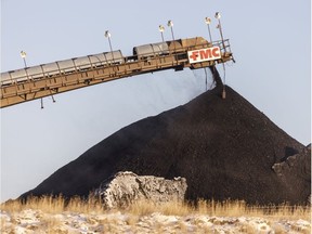 Coal is stockpiled from the Sheerness Coal Mine on Nov. 6, 2019. The strip mine provides coal for the nearby Sheerness Generating Station south of Hanna. PHOTO BY MIKE DREW /Postmedia, file