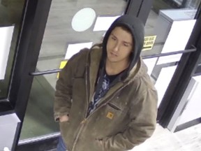 Edmonton police seek the public's help in identifying a suspect in a January assault, arson and theft from a liquor store. Image supplied