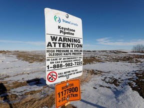 The route of the Keystone XL crude oil pipeline lies idle through a farmer's field after construction stopped near Oyen on Feb. 1, 2021.