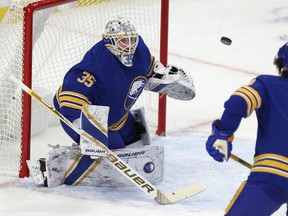 Buffalo Sabres goaltender Linus Ullmark (35) looks to make a save during the first period against the New York Islanders at KeyBank Center  on  Feb. 15, 2021.