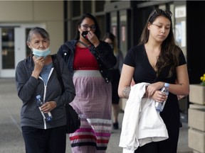 Donna McLeod (left, mother of Cindy Gladue) and Cheyanne Gladue (right, daughter of Cindy Gladue), leave the Edmonton courthhouse on Tuesday July 27, 2021 after the sentencing of Bradley Barton for the deadly sex assault at the Yellowhead Inn in Edmonton in 2011. The Ontario trucker was sentenced to twelve and a half years in prison.