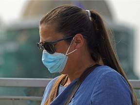 This nurse joined approximately 200 people at a rally near the Alberta legislature on Friday, July 30, 2021, to protest the Alberta government's lifting of pandemic restrictions.