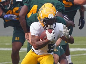 Terry Williams carries the ball at Edmonton Elks training camp in Edmonton on Thursday July 15, 2021.