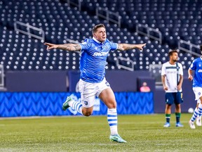 Fraser Aird of FC Edmonton celebrates his goal against York United in a Canadian Premier League game at Investors Group Field in Winnipeg on July 4, 2021.