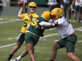 Taylor Cornelius throws throws the ball during Edmonton Elks training camp on Sunday, July 11, 2021, in Edmonton.