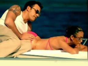 Ben Affleck and Jennifer Lopez in a scene from her 2002 music video for her hit song Jenny from the Block.