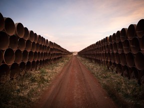 Miles of unused pipe for the proposed Keystone XL pipeline, sit in a lot in North Dakota in 2014. Ten years ago, when TC Energy announced the expansion, few would have believed the great project would be killed off.