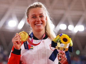 Gold medalist Kelsey Mitchell of Team Canada, poses during the medal ceremony after the Women's sprint finals of the track cycling on day sixteen of the Tokyo 2020 Olympic Games at Izu Velodrome on August 08, 2021 in Izu, Shizuoka, Japan.
