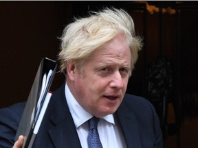 UK Prime Minister, Boris Johnson leaves Number 10 Downing Street to attend Parliament on August 18, 2021 in London, England.