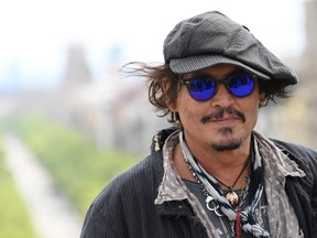 Johnny Depp poses during the photocall of the film "Minamata" at the BCN Film Fest on April 16, 2021 in Barcelona.