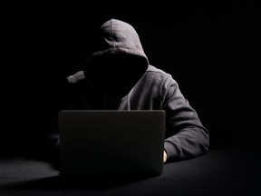 This photo Illustration shows a hacker.