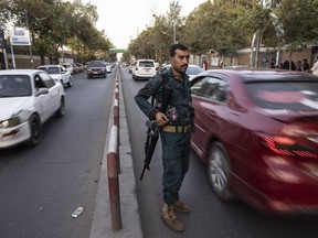Kabul police secure the roads with police checkpoints on Aug. 13, 2021 in Kabul, Afghanistan.