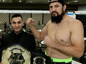 Unified MMA president Sunny Sareen, left, holds the heavyweight championship belt next to Tony Lopez in this file photo from 2015. The local promotion will soon be avaiable on the UFC Fight Pass streaming service.