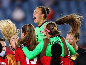 Kailen Sheridan of Canada and teammates celebrate winning the match against Brazil at the Miyagi Stadium in Miyagi, Japan on July 30, 2021.