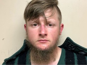 Robert Aaron Long, 21, of Woodstock in Cherokee County poses in a jail booking photograph after he was taken into custody by the Crisp County Sheriff's Office in Cordele, Georgia, U.S. March 16, 2021.