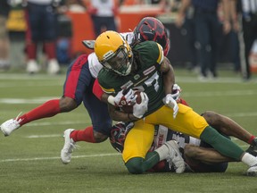 Derel Walker (87) of the Edmonton Elks catches a pass against  the Montreal Alouettes at Commonwealth Stadium in Edmonton on Aug. 14, 2021.
