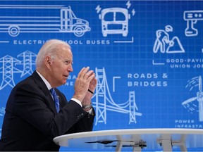 U.S. President Joe Biden meets virtually with governors, mayors, and other state and local elected officials to discuss the bipartisan Infrastructure Investment and Jobs Act, in the South Court Auditorium at the White House in Washington, U.S., on Aug. 11, 2021.