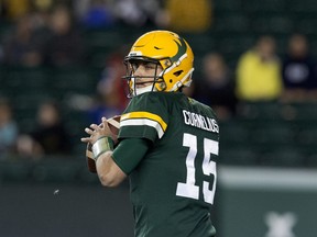 The Edmonton Elks quarterback Taylor Cornelius (15) battles the Winnipeg Blue Bombers during first half CFL action at Commonwealth Stadium, in Edmonton Saturday Sept. 18, 2021.