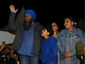 Conservative incumbent Tim Uppal with family members at his campaign office, waving to supporters gets re-elected in the Edmonton Mill Woods riding, September 20, 2021. Ed Kaiser/Postmedia