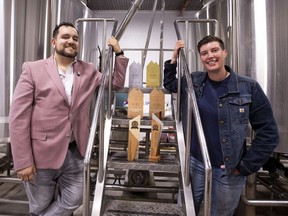 Adam Corsaut, president of Analog Brewing Company, with head brewer Lisa Drapaka on Sunday, Sept. 26, 2021 in Edmonton. This small Edmonton brewery, which opened in 2018, has earned gold at the 2021 Canadian Brewing Awards in the Cream Ale category for their Retro Style - Pre Prohibition Cream Ale.