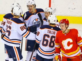 Edmonton Oilers prospect Raphael Lavoie celebrates with teammates after scoring during an exhibition game against the Calgary Flames in  Calgary on Monday, September 20, 2021.